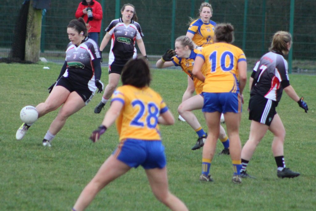 Sligo footballer Gráinne O'Loughlin in action against Clare.