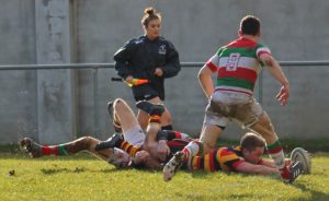 Ryan Feehily stretches to ground the ball