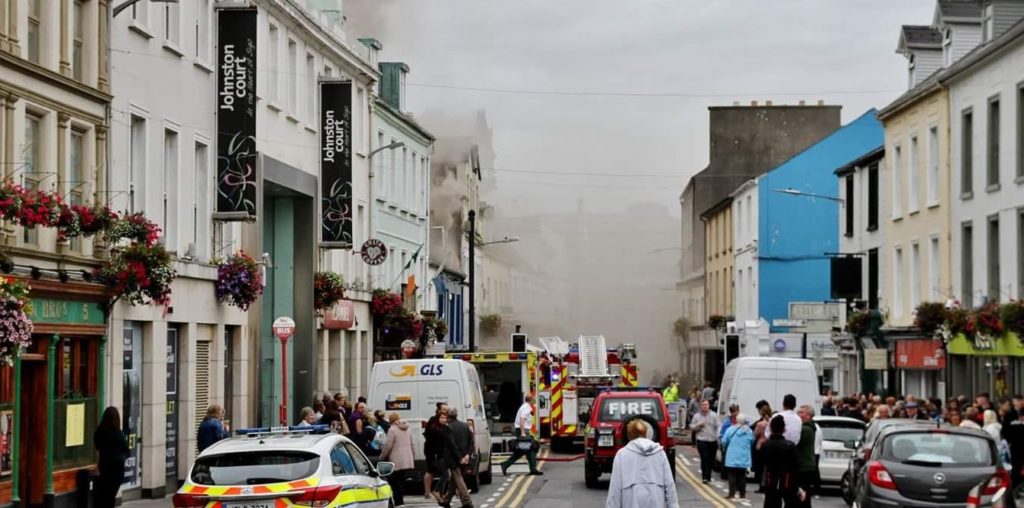 Smoke covers O'Connell Street in Sligo after a fire broke out at McGarrigles Pub