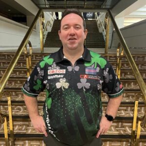 Brendan Dolan competes in World Cup of Darts