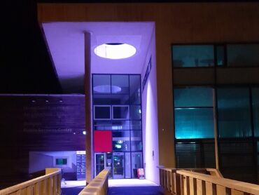 Buildings in North West go purple to support domestic services